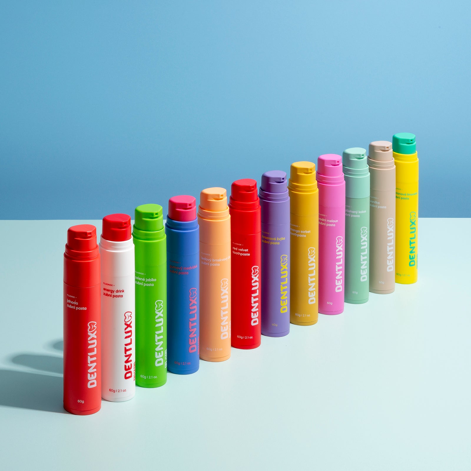 Dentlux balíček 12 ochucených zubních past + 4 nanokartáčky zdarma