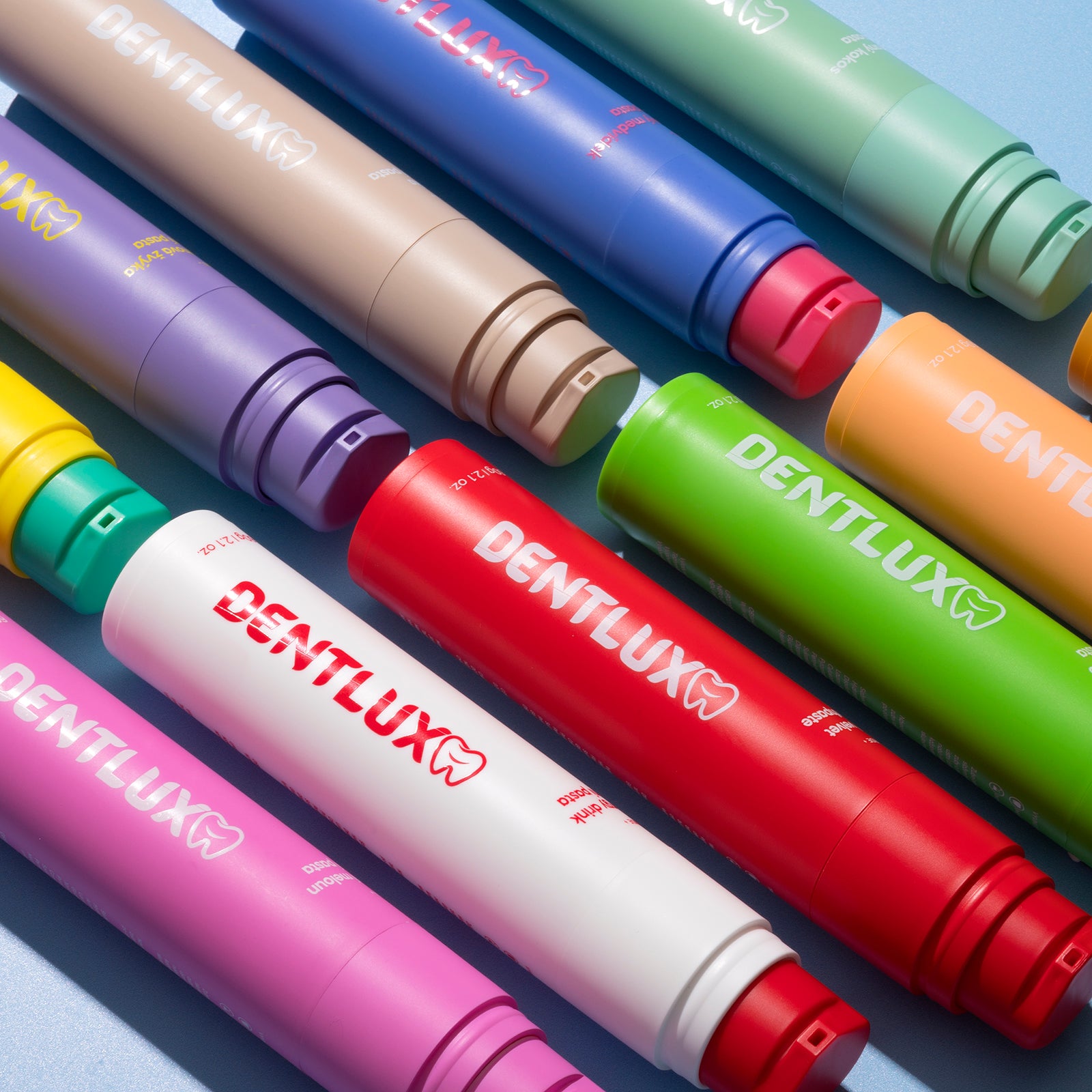 Dentlux balíček 12 ochucených zubních past + 4 nanokartáčky zdarma